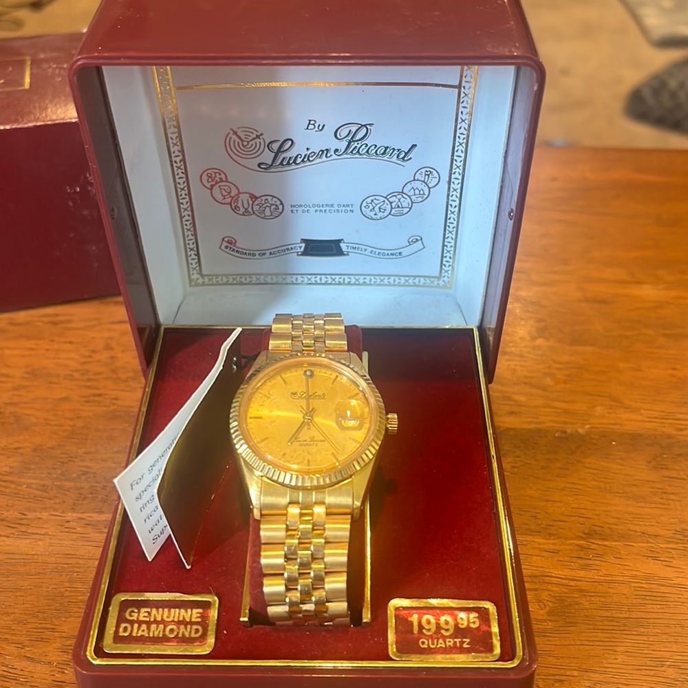 Dufonte by Lucien Piccard men’s gold watch. Genuine diamond.